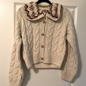 Cable knit cardigan with lapel printed collar.